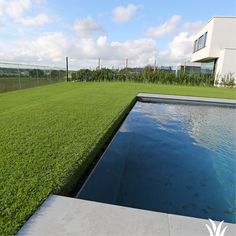 Grasmeester kunstgras - Filtersysteem netjes weggewerkt onder kunstgras