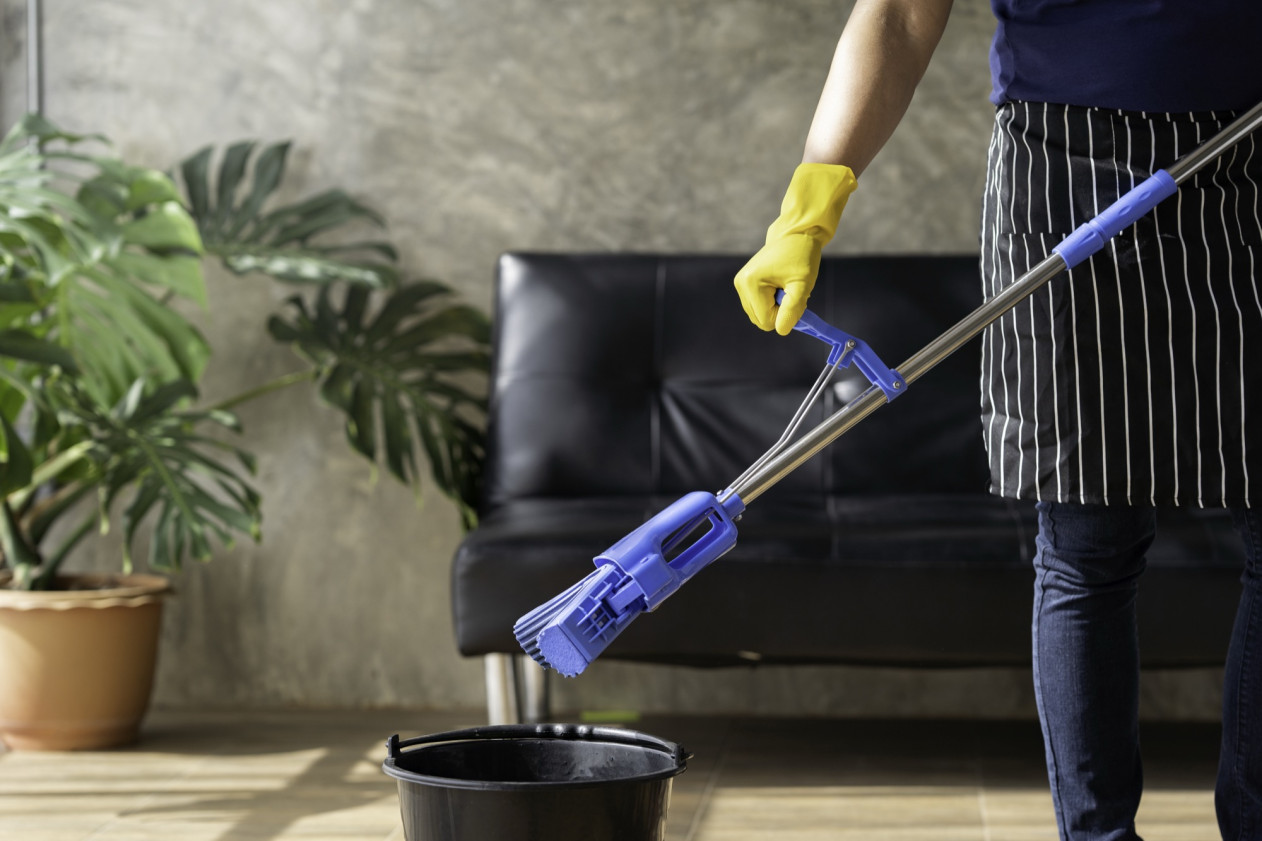 a-young-butler-cleans-the-floor-mops-the-floor-c-2026-01-08-02-29-44-utc